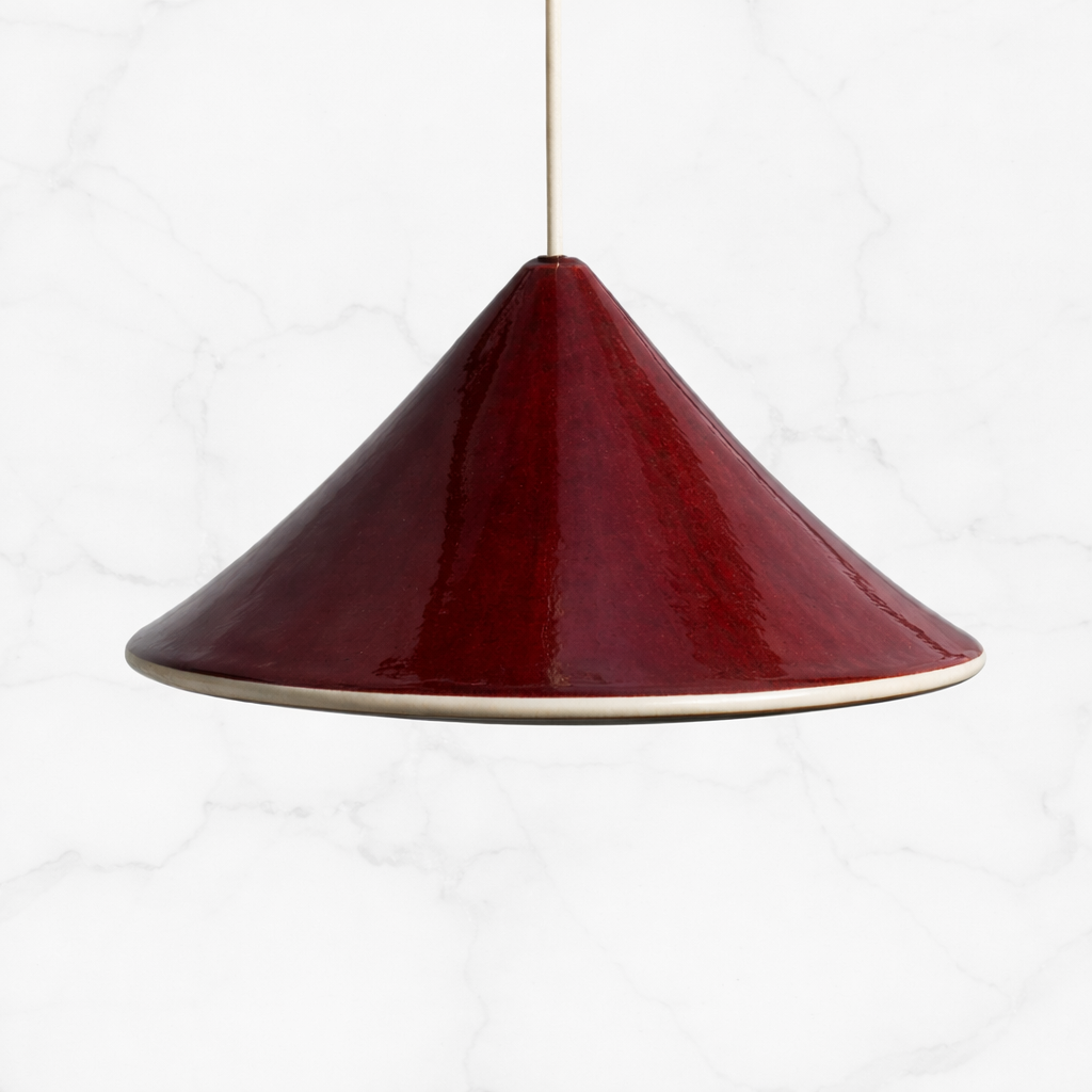 Fuji pendant light in deep Shiraz red ceramic glaze with gloss finish, handcrafted sculptural cone shade
