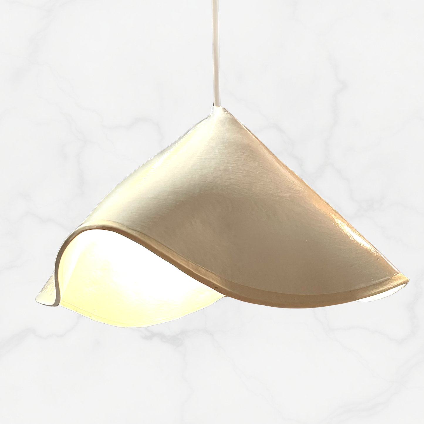 The Audrey pendant handcrafted ceramic pendant light Australia in glossy white finish with clean folded ceramic form