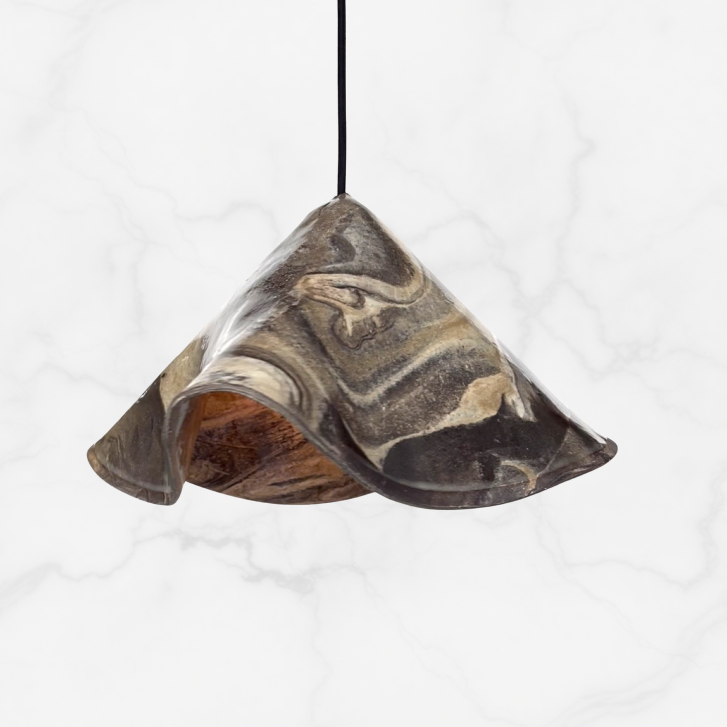 The Audrey pendant handcrafted ceramic pendant light Australia in marbled clay finish with layered natural tones and folded form
