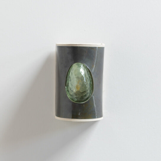Avocado Wall Sconce with Glass handcrafted ceramic wall light Australia showing green glass emerging through dark ceramic surface