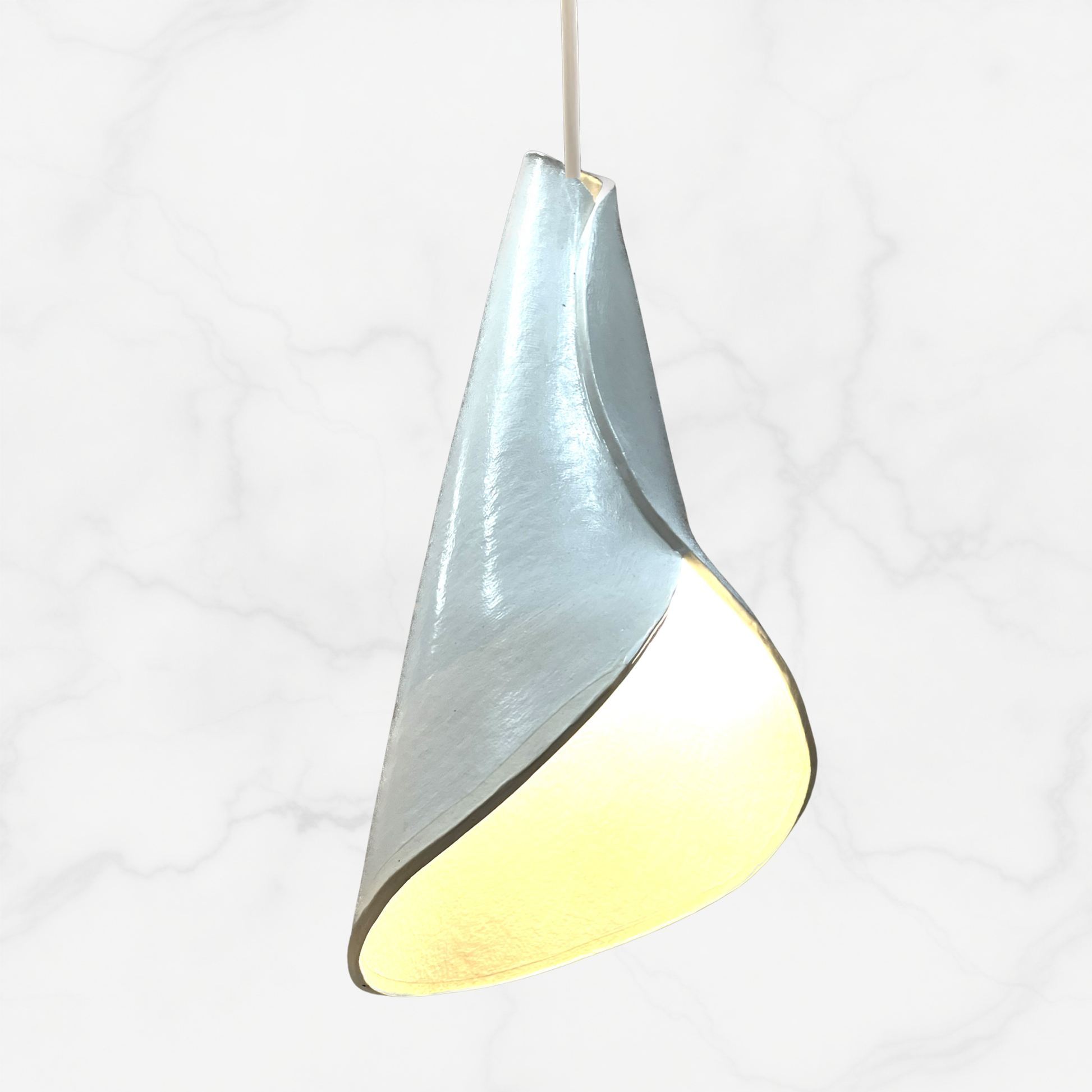 The Bouquet pendant handcrafted ceramic pendant light Australia in glossy white finish with clean sculptural folded ceramic form
