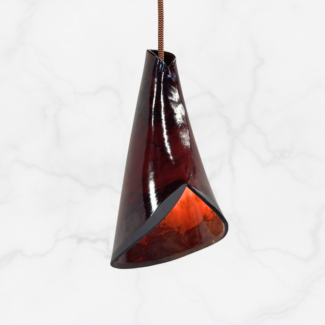 The Bouquet pendant handcrafted ceramic pendant light Australia sculptural lighting inspired by folded organic forms and soft internal glow