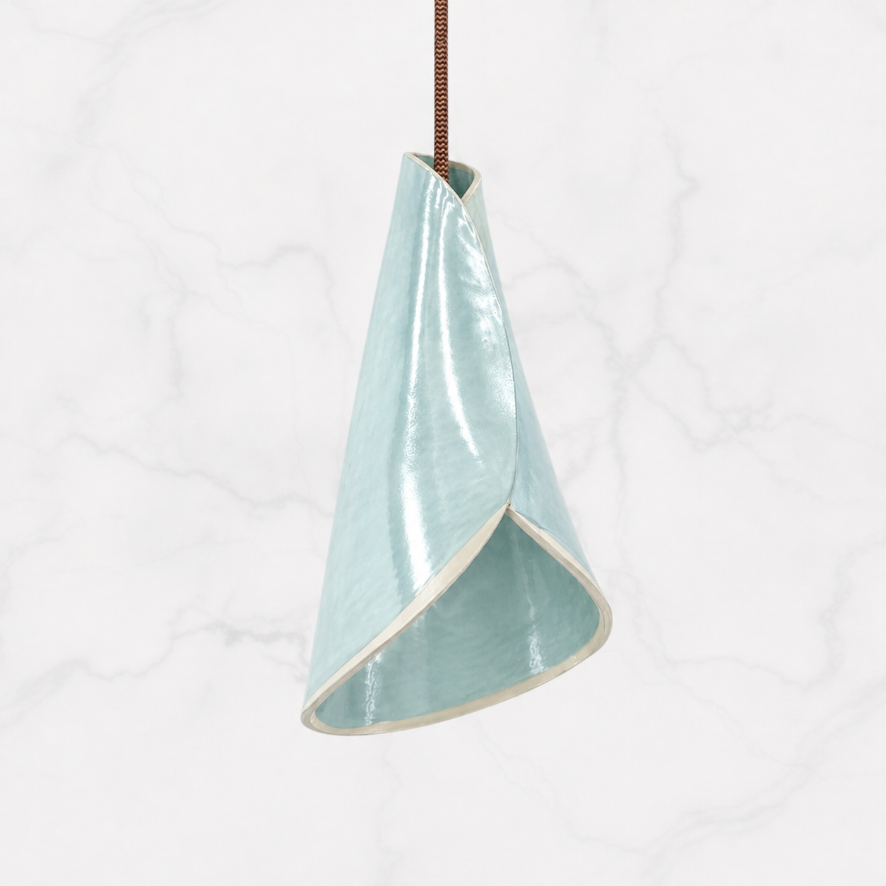 Handcrafted ceramic bouquet pendant light in soft blue glaze with folded form design, made in Australia