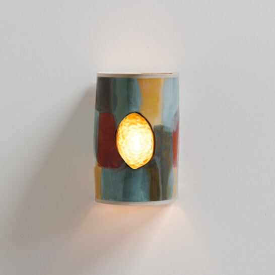 Carnival Wall Sconce with Glass handcrafted ceramic wall light Australia with multicolour glaze and glowing glass insert lit with ambient light