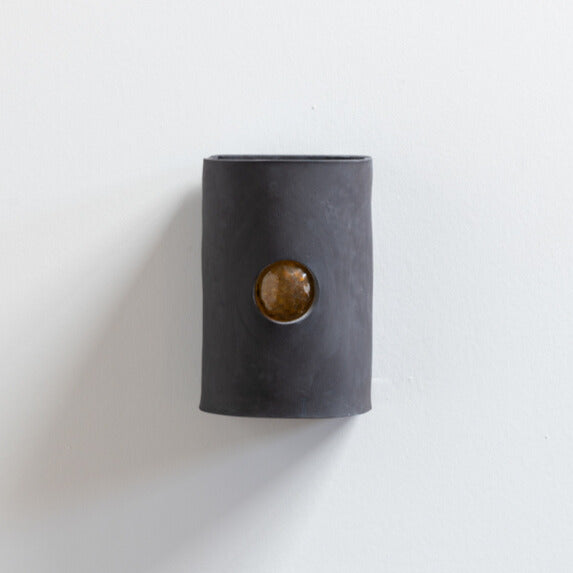 Charcoal Wall Sconce with Glass handcrafted ceramic wall light Australia with raw unglazed black clay and glass insert on white background