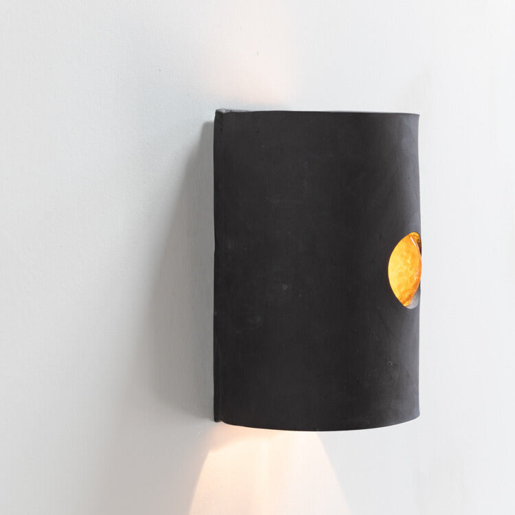 Charcoal Wall Sconce with Glass handcrafted ceramic wall light Australia showing side detail of glass emerging through ceramic form