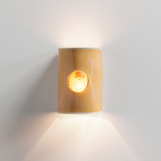 Coral Wall Sconce with Glass handcrafted ceramic wall light Australia with warm coral glaze and glowing glass insert lit with ambient light