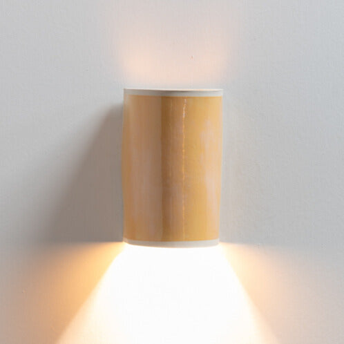 Coral Wall Sconce handcrafted ceramic wall light Australia lit showing warm ambient light cast upward and downward