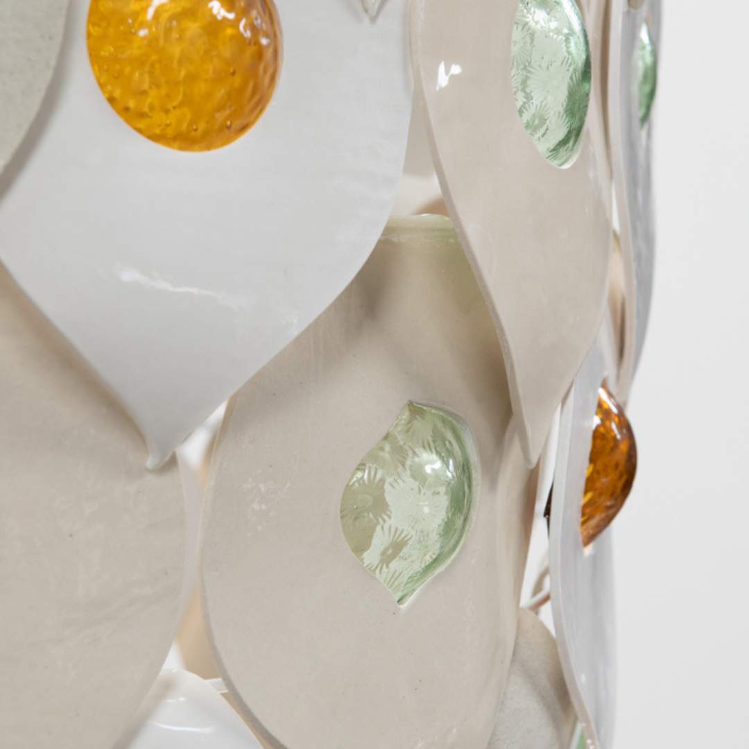 Dawn chandelier handcrafted ceramic and glass pendant light Australia close up showing layered ceramic petals and multicolour glass inserts glowing