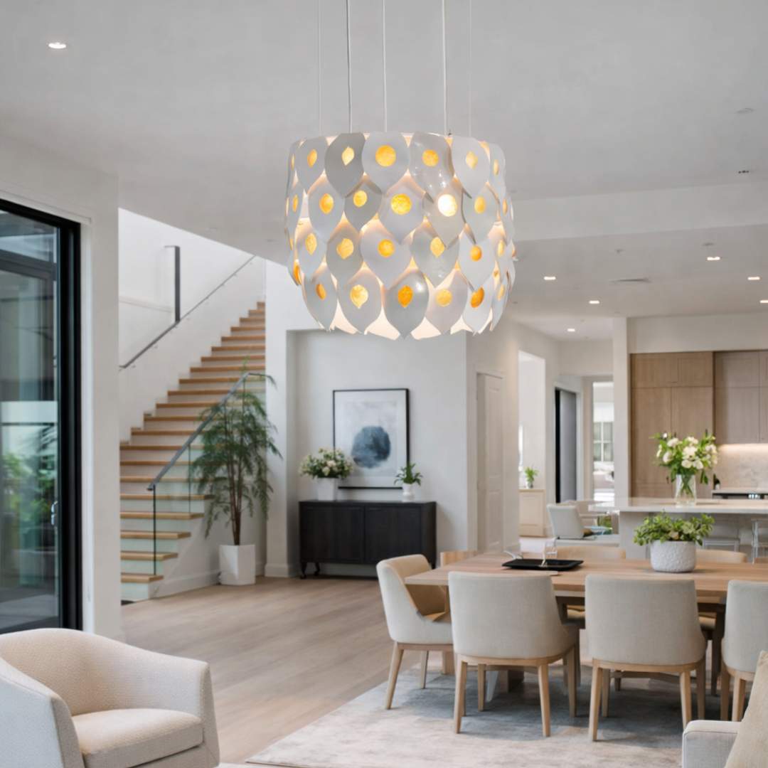 Dawn chandelier handcrafted ceramic and glass pendant light Australia installed in modern living and dining interior glowing warm ambient light