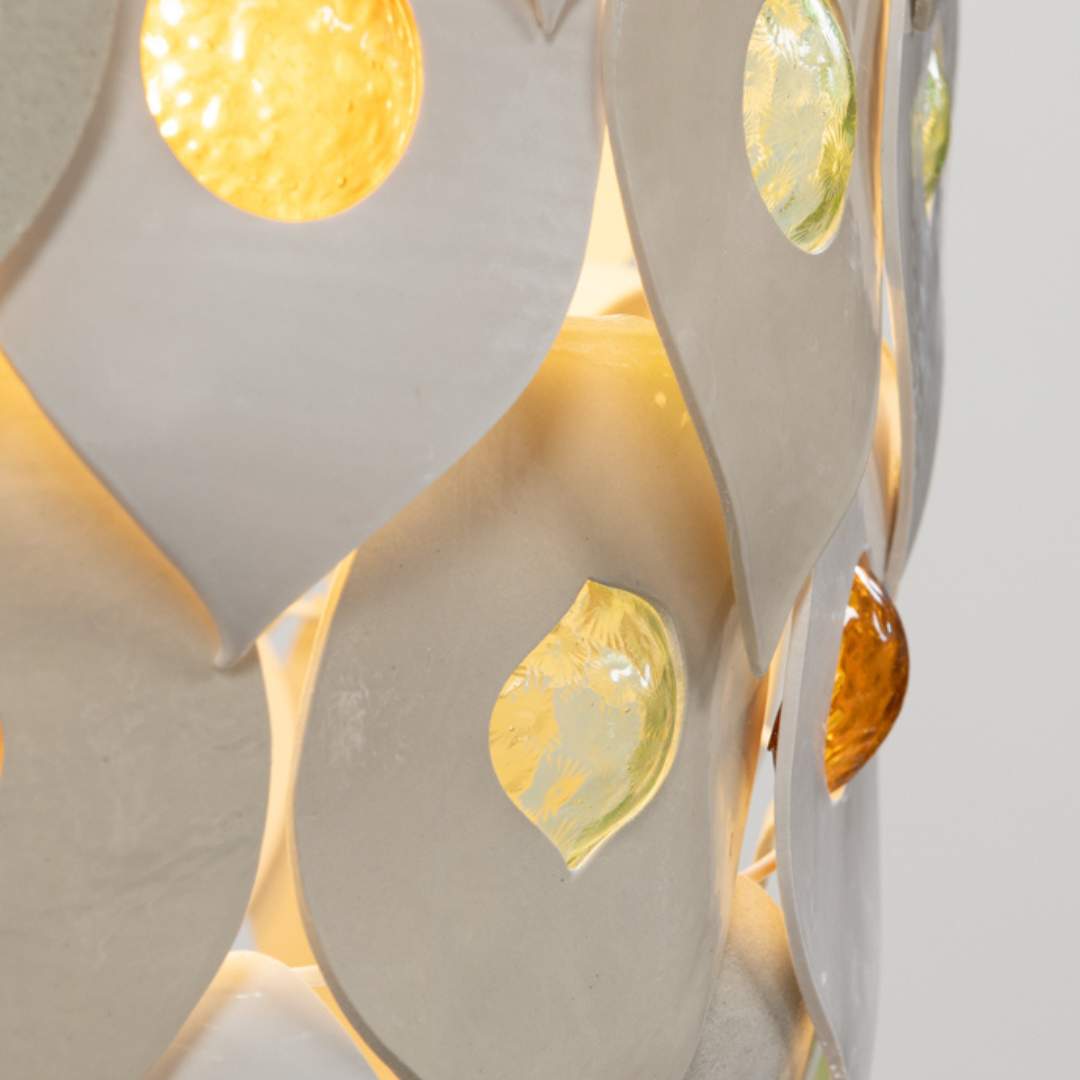 Dawn chandelier handcrafted ceramic and glass pendant light Australia close up showing layered ceramic petals and multicolour glass inserts glowing