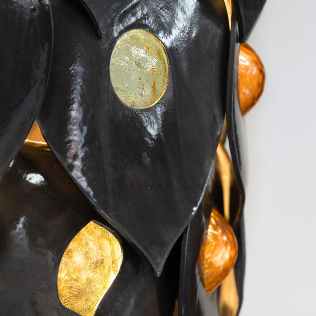 Dusk chandelier handcrafted black ceramic and glass pendant light Australia close up showing textured glass inserts and glossy ceramic surface