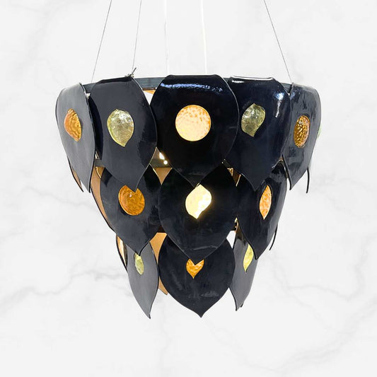 Ember chandelier handcrafted black ceramic and glass pendant light Australia sculptural layered form with warm glowing glass elements