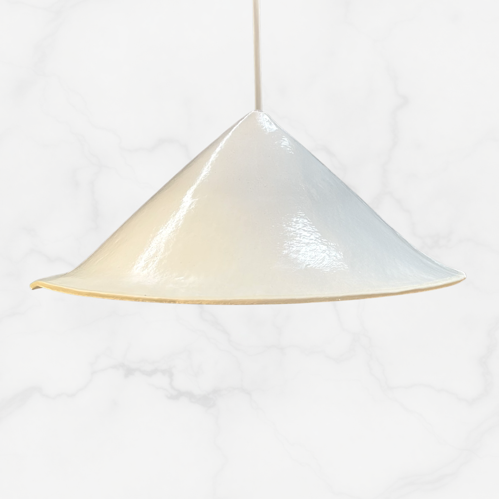The Envelope pendant handcrafted ceramic pendant light Australia in glossy white finish with clean folded silhouette and ambient lighting