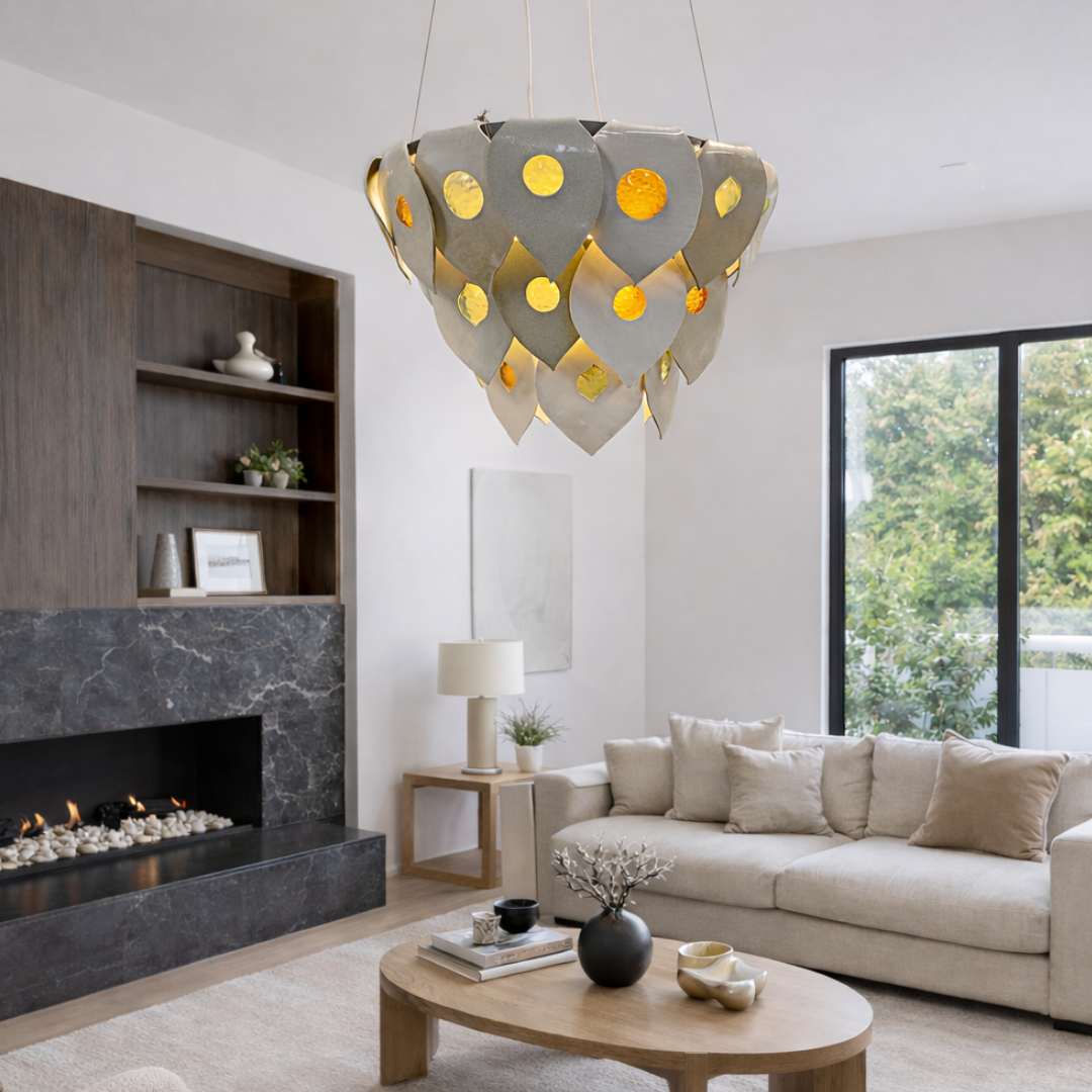Halo chandelier handcrafted ceramic and glass pendant light Australia installed in modern living room creating warm ambient glow