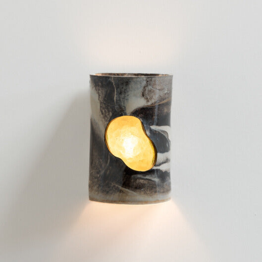 Marble Wall Sconce with Glass handcrafted ceramic wall light Australia lit showing glowing glass insert and warm ambient light