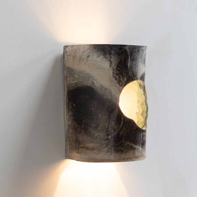 Marble Wall Sconce with Glass handcrafted ceramic wall light Australia lit from angle showing glowing glass insert and ambient light