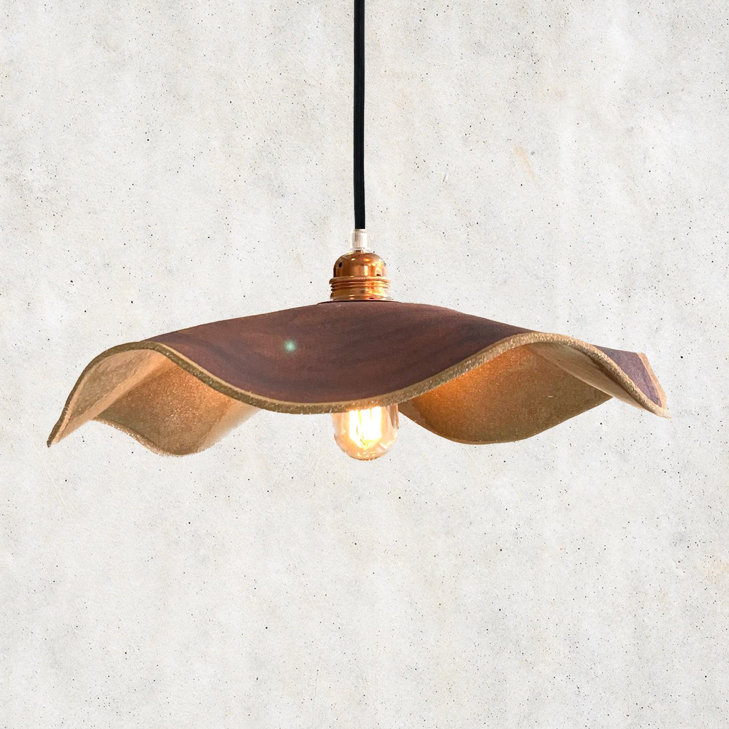 Marilyn Pendant handcrafted ceramic pendant light Australia in warm amber rust finish with sculptural flowing form