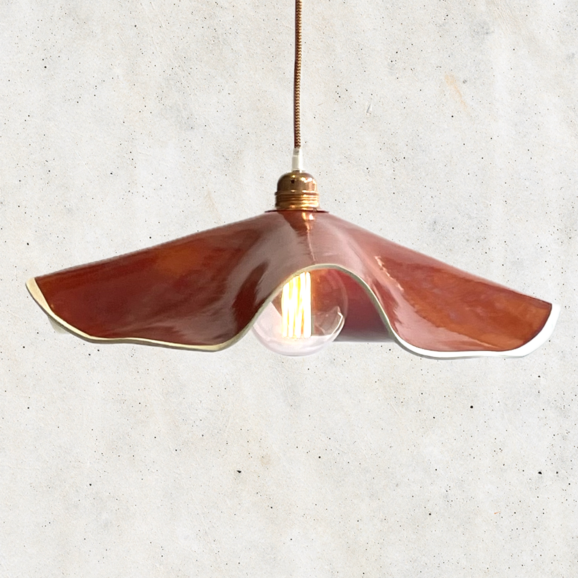 Marilyn Pendant handcrafted ceramic pendant light Australia in burnt orange gloss glaze with soft curved edges
