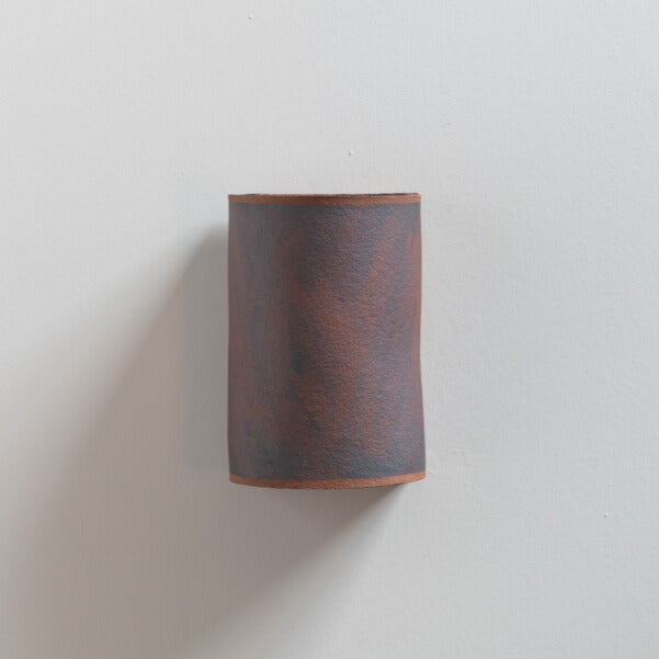 Rust Wall Sconce handcrafted ceramic wall light Australia with textured rust-inspired finish on white background