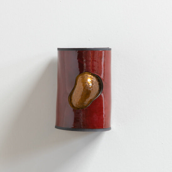 Shiraz Wall Sconce with Glass handcrafted ceramic wall light Australia showing glass emerging through deep wine-coloured ceramic surface