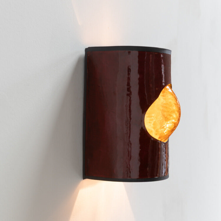 Shiraz Wall Sconce with Glass handcrafted ceramic wall light Australia lit from side angle showing glowing glass insert and warm ambient light