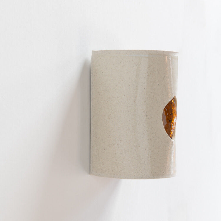Stone Wall Sconce with Glass handcrafted ceramic wall light Australia showing detail of glass emerging through ceramic form