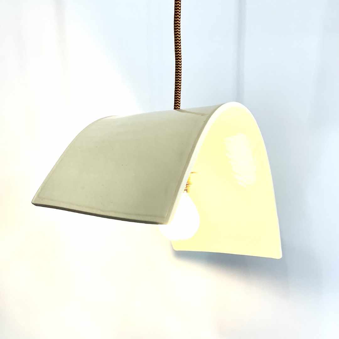 Tile pendant handcrafted ceramic pendant light Australia in glossy white finish with curved architectural form and soft lighting