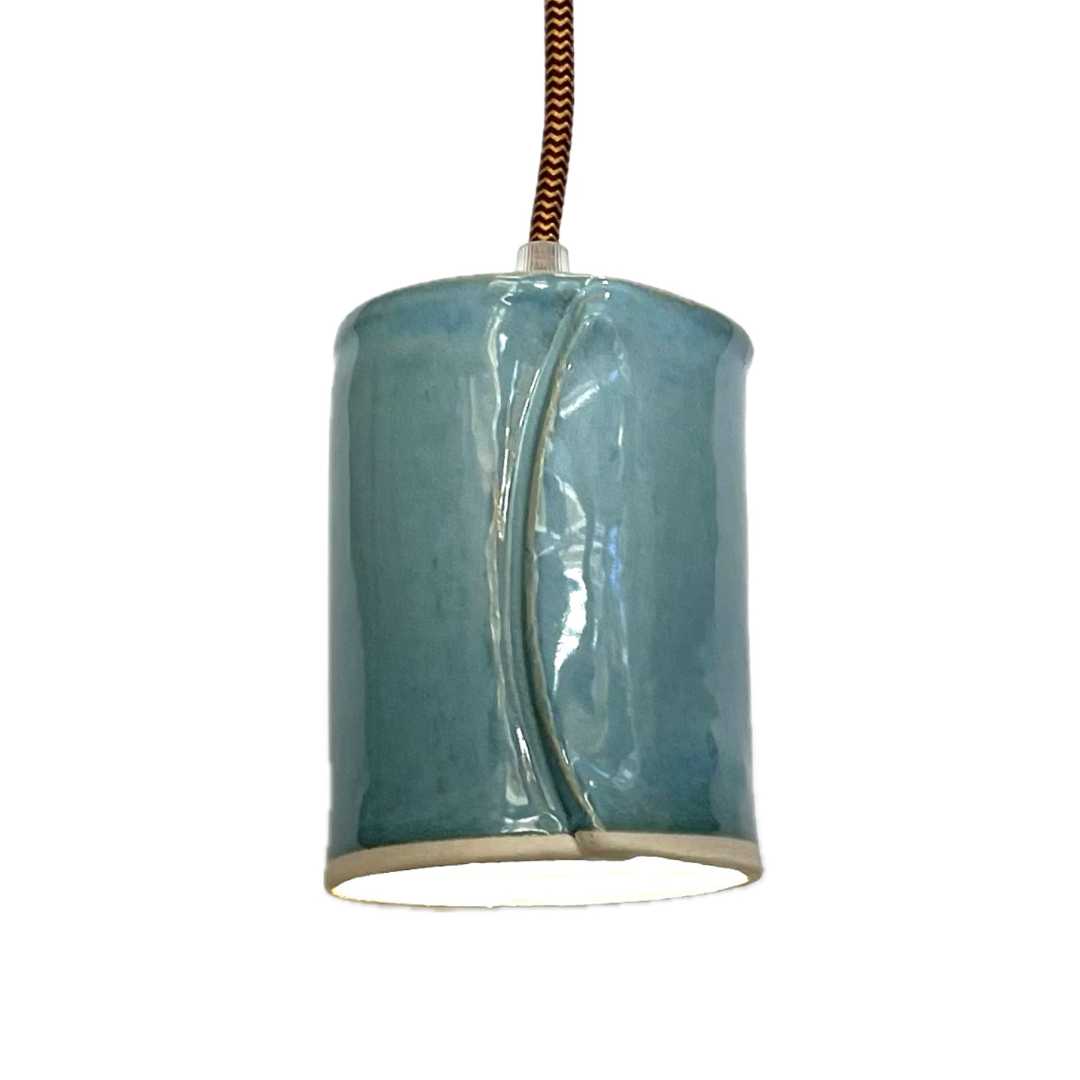 The Tumbler pendant handcrafted ceramic light Australia in Lac Bleu glaze with cylindrical form and soft reflective surface