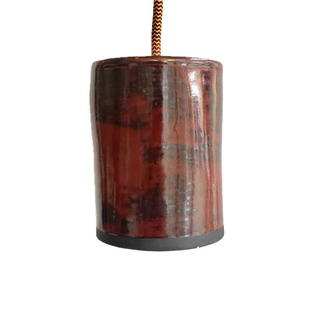 The Tumbler pendant handcrafted ceramic light Australia in Shiraz glaze with deep red tones and cylindrical form